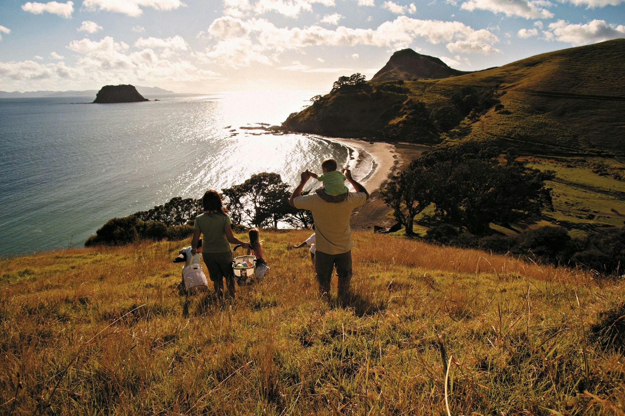 A family by the beach in Coromandel