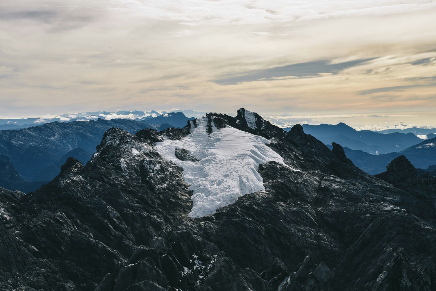 People climbing near glacier
