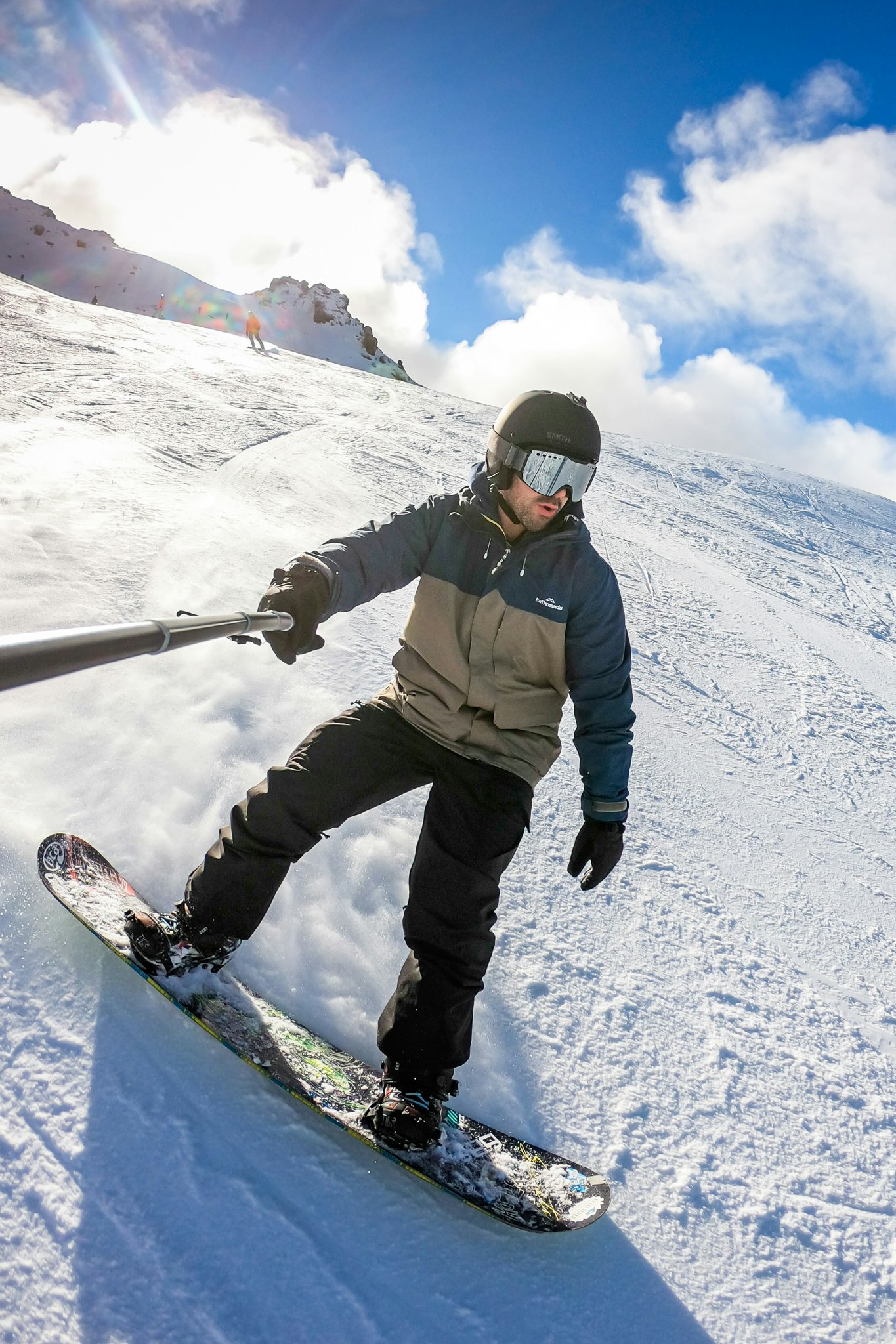 Board up and the snow's your oyster One half of Nomadasaurus boarding on the slopes of Cardrona, NZ
