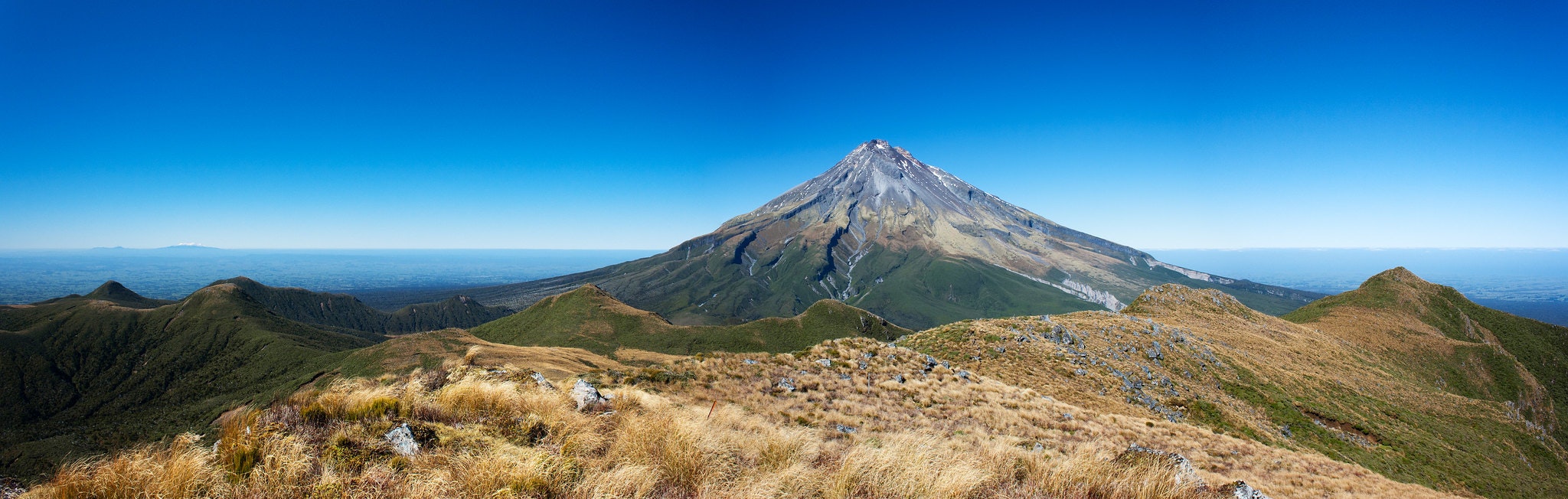 Mount Taranaki towers over the Maketawaw Hut Circuit Mount Taranaki, New Zealand