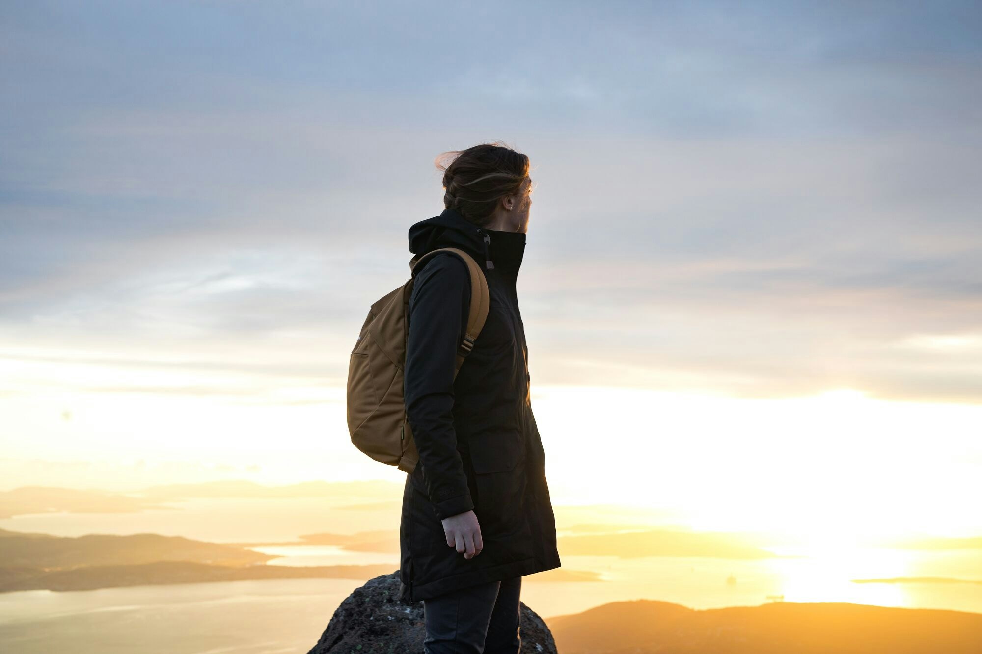 The unbeatable view from Mount Wellington Woman looking out over Hobart from Mount Wellington