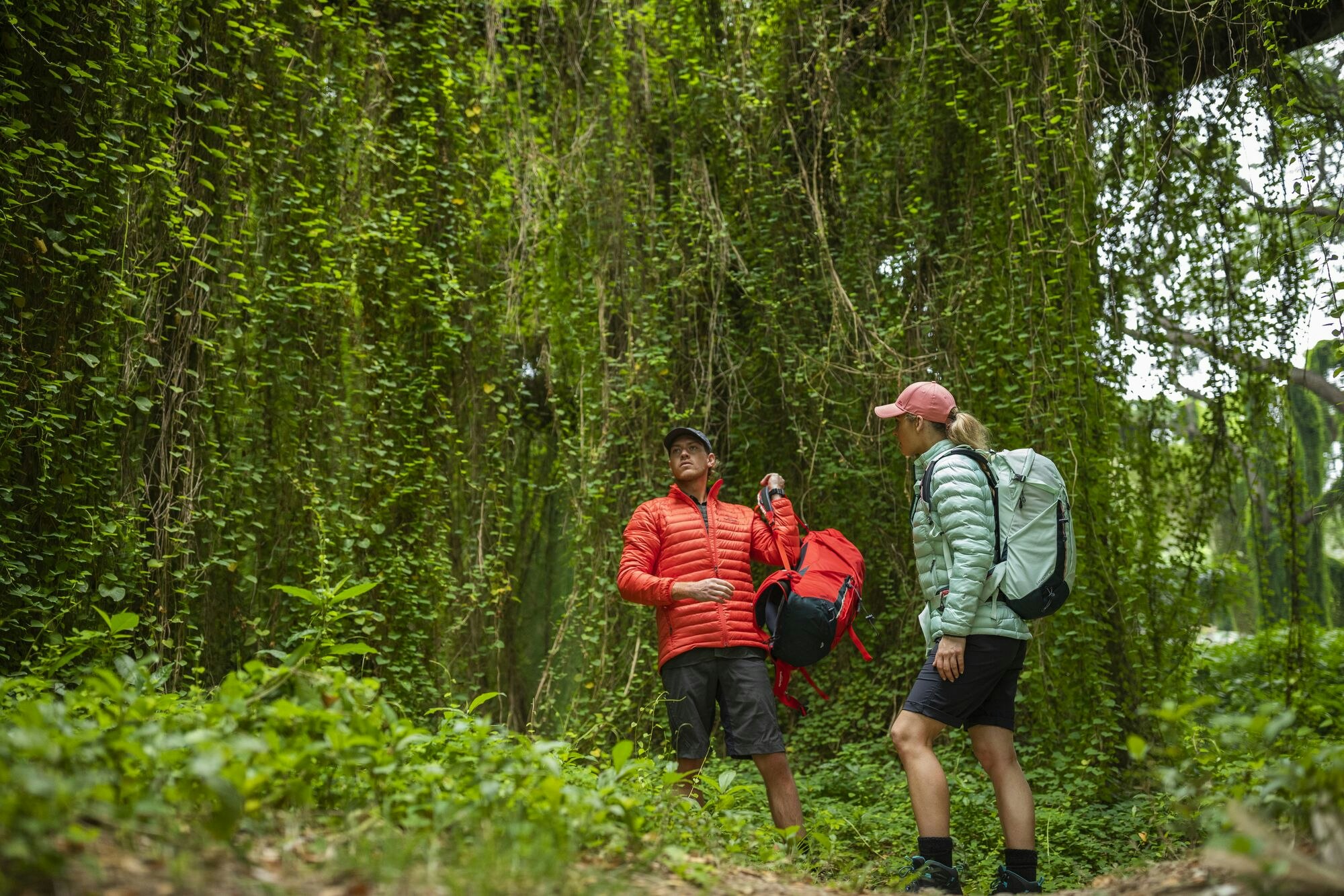 Sturdy, comfy boots will help you push on to the end of the trail A couple hiking up a hill